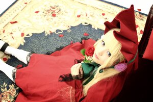 Rating: Safe Score: 0 Tags: 1girl blonde_hair blue_eyes bonnet bow dress flower long_hair petals red_dress red_rose rose rose_petals shinku solo User: admin