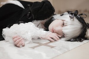 Rating: Safe Score: 0 Tags: 1girl bangs blurry blurry_background blurry_foreground closed_mouth depth_of_field dress frills gothic_lolita hairband head_rest lace lips lolita_fashion long_sleeves looking_at_viewer nail_polish photo ribbon solo suigintou upper_body User: admin