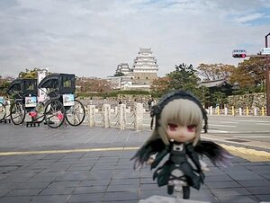 Rating: Safe Score: 0 Tags: 1girl building city doll gothic_lolita ground_vehicle hairband lolita_fashion long_hair motor_vehicle red_eyes solo street suigintou User: admin