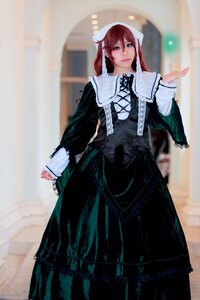 Rating: Safe Score: 0 Tags: 1girl 3d black_dress blurry blurry_background brown_hair corset depth_of_field dress frills long_hair long_sleeves looking_at_viewer photo red_eyes red_hair solo standing suiseiseki User: admin
