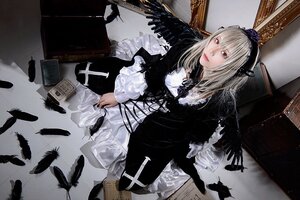 Rating: Safe Score: 0 Tags: 1girl bird black_feathers black_wings crow dress feathers hairband lips long_hair long_sleeves looking_at_viewer red_eyes ribbon solo suigintou wings User: admin
