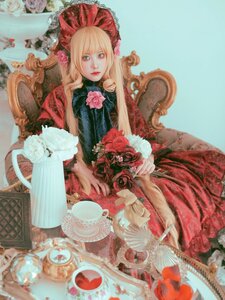 Rating: Safe Score: 0 Tags: 1girl blonde_hair blue_eyes blurry depth_of_field dress flower lips long_hair red_dress rose shinku sitting solo white_flower User: admin