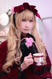 Rating: Safe Score: 0 Tags: 1girl blonde_hair blue_eyes blurry cup depth_of_field flower holding lips lolita_fashion long_hair looking_at_viewer pink_flower pink_rose realistic rose saucer shinku sitting solo teacup User: admin