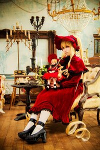 Rating: Safe Score: 0 Tags: 1girl blonde_hair blue_eyes bonnet dress indoors red_dress shinku sitting solo table User: admin