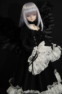 Rating: Safe Score: 0 Tags: 1girl bangs black_background black_theme closed_mouth dark doll dress expressionless flower frills long_hair long_sleeves solo suigintou wings User: admin