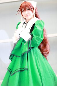 Rating: Safe Score: 0 Tags: 1girl bangs dress frills green_dress green_eyes long_hair long_sleeves looking_at_viewer pink_hair smile solo standing suiseiseki very_long_hair User: admin