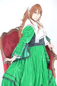 Rating: Safe Score: 0 Tags: brown_hair dress green_dress long_hair long_sleeves looking_at_viewer pointy_ears sitting solo suiseiseki User: admin