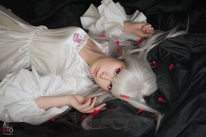 Rating: Safe Score: 0 Tags: 1girl dress lips long_hair looking_at_viewer lying petals red_eyes solo suigintou white_dress white_hair wide_sleeves User: admin