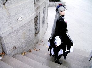 Rating: Safe Score: 0 Tags: 1girl black_footwear boots dress frills hairband long_hair long_sleeves silver_hair solo standing suigintou User: admin