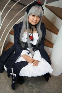 Rating: Safe Score: 0 Tags: 1girl dress flower frills hairband high_heels lips long_hair long_sleeves looking_at_viewer red_eyes rose silver_hair sitting solo suigintou User: admin