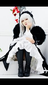 Rating: Safe Score: 0 Tags: 1girl black_footwear boots dress flower frills gothic_lolita hairband letterboxed lolita_fashion long_hair long_sleeves rose sitting solo suigintou white_hair User: admin