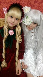 Rating: Safe Score: 0 Tags: 2girls blonde_hair blue_eyes braid dress flower hair_ornament lips long_hair looking_at_viewer multiple_cosplay multiple_girls red_dress rose shinku siblings sisters smile tagme white_flower white_rose User: admin