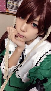 Rating: Safe Score: 0 Tags: 1girl brown_hair closed_mouth dress frills green_dress green_eyes lips looking_at_viewer realistic solo suiseiseki User: admin