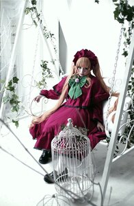 Rating: Safe Score: 0 Tags: 1girl blonde_hair bonnet bow bowtie cage dress flower green_bow green_neckwear long_hair long_sleeves looking_at_viewer red_dress shinku shoes sitting solo twintails User: admin
