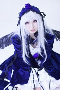 Rating: Safe Score: 0 Tags: 1girl blurry dress feathers flower frills gothic_lolita hairband lips lolita_fashion long_hair long_sleeves looking_at_viewer rose solo suigintou User: admin