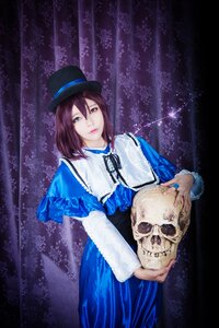 Rating: Safe Score: 0 Tags: 1girl blue_dress brown_hair capelet dress hat holding long_sleeves looking_at_viewer ribbon short_hair skull solo souseiseki top_hat User: admin