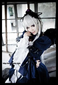 Rating: Safe Score: 0 Tags: 1girl black_border blurry depth_of_field dress letterboxed long_sleeves looking_at_viewer solo suigintou white_hair User: admin