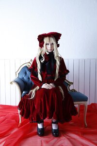 Rating: Safe Score: 0 Tags: 1girl black_footwear blonde_hair blue_eyes bonnet chair curtains dress flower long_hair long_sleeves looking_at_viewer red_dress rose shinku shoes sitting solo User: admin