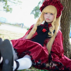 Rating: Safe Score: 0 Tags: 1girl bangs blonde_hair blue_eyes blurry bonnet boots depth_of_field doll_joints dress flower hat long_hair long_sleeves looking_at_viewer outdoors shinku sitting solo User: admin