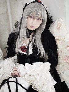 Rating: Safe Score: 0 Tags: 1girl black_dress chair dress flower frills gothic_lolita hairband lace lips lolita_fashion long_hair long_sleeves looking_at_viewer red_eyes rose sitting solo suigintou User: admin