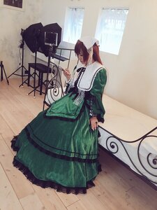Rating: Safe Score: 0 Tags: 1girl brown_hair closed_eyes dress green_dress long_sleeves profile solo suiseiseki wooden_floor User: admin