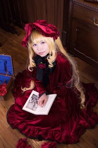 Rating: Safe Score: 0 Tags: 1girl blonde_hair blue_eyes book bow dress flower lips lolita_fashion long_hair looking_at_viewer realistic red_dress red_flower red_rose rose shinku sitting solo User: admin