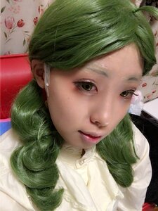 Rating: Safe Score: 0 Tags: 1girl choker curly_hair face green_eyes green_hair kanaria lips looking_at_viewer nose portrait realistic solo User: admin