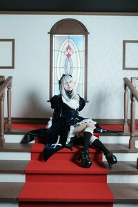 Rating: Safe Score: 0 Tags: 1girl black_footwear black_legwear boots dress frills gothic_lolita hairband indoors lolita_fashion red_eyes silver_hair sitting solo suigintou User: admin