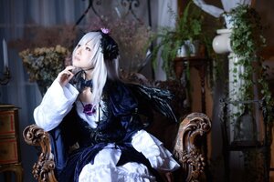 Rating: Safe Score: 0 Tags: 1girl chair dress flower frills gothic_lolita indoors lolita_fashion long_hair long_sleeves plant silver_hair sitting solo suigintou User: admin
