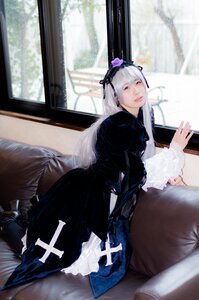 Rating: Safe Score: 0 Tags: 1girl dress flower frills gothic_lolita hairband indoors lolita_fashion long_hair long_sleeves looking_at_viewer silver_hair sitting solo suigintou window User: admin