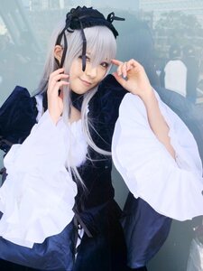 Rating: Safe Score: 0 Tags: 1girl bangs closed_mouth lips long_hair long_sleeves looking_at_viewer ribbon silver_hair sitting solo suigintou User: admin