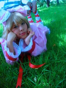 Rating: Safe Score: 0 Tags: 1girl blonde_hair blue_eyes day grass hinaichigo lips lying nose on_grass outdoors realistic ribbon solo User: admin