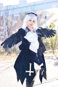 Rating: Safe Score: 0 Tags: 1girl black_legwear black_wings blurry blurry_background blurry_foreground depth_of_field feathered_wings feathers long_hair long_sleeves looking_at_viewer outdoors photo_background solo standing suigintou white_hair wings User: admin