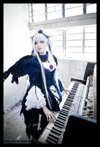 Rating: Safe Score: 0 Tags: 1girl black_border black_wings blue_eyes dress feathers flower frills instrument letterboxed long_hair long_sleeves looking_at_viewer piano pillarboxed solo suigintou window wings User: admin