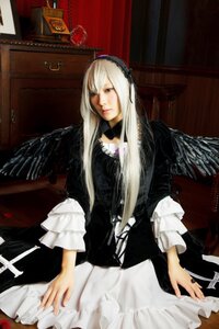 Rating: Safe Score: 0 Tags: 1girl black_dress black_wings dress frills hairband long_hair long_sleeves silver_hair sitting solo suigintou wings User: admin