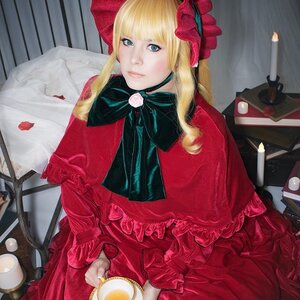 Rating: Safe Score: 0 Tags: 1girl bangs blonde_hair blue_eyes bow dress flower frills lips long_hair photo realistic red_dress rose shinku sitting solo teacup User: admin