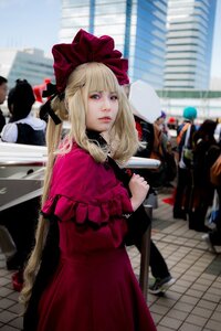 Rating: Safe Score: 0 Tags: 1girl black_bow blonde_hair blue_eyes blurry blurry_background bow depth_of_field dress hair_bow lips lolita_fashion long_hair long_sleeves looking_at_viewer realistic red_dress shinku solo solo_focus User: admin
