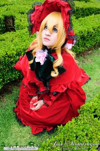 Rating: Safe Score: 0 Tags: 1girl blonde_hair blue_eyes bonnet bow bug butterfly capelet dress flower grass insect lips long_hair outdoors red_capelet red_dress rose shinku sitting solo User: admin