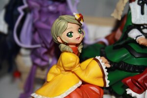 Rating: Safe Score: 0 Tags: 1boy 2girls blurry blurry_background blurry_foreground depth_of_field doll dress figure frills green_eyes kanaria long_sleeves motion_blur multiple_dolls multiple_girls open_mouth sitting smile solo_focus tagme User: admin