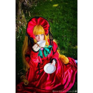 Rating: Safe Score: 0 Tags: 1girl bangs blonde_hair blue_eyes bonnet bow bowtie cup dress flower long_hair long_sleeves looking_at_viewer red_dress saucer shinku sitting solo tea teacup twintails very_long_hair User: admin