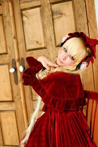 Rating: Safe Score: 0 Tags: 1girl blonde_hair blue_eyes bonnet dress flower lace lips long_sleeves looking_at_viewer red_dress rose shinku solo User: admin