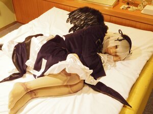 Rating: Safe Score: 0 Tags: 1girl bed dress lying on_side photo sitting solo suigintou white_hair User: admin