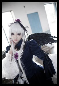 Rating: Safe Score: 0 Tags: 1girl black_border black_wings blurry dress feathered_wings feathers flower gothic_lolita hairband letterboxed lips lolita_fashion lolita_hairband long_sleeves looking_at_viewer rose silver_hair solo suigintou wings User: admin