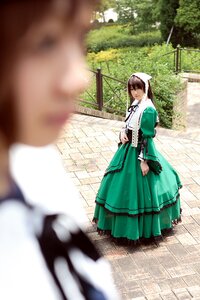 Rating: Safe Score: 0 Tags: 1girl blue_dress blurry blurry_background blurry_foreground brown_hair closed_eyes day depth_of_field dress frills green_dress long_sleeves motion_blur multiple_cosplay outdoors shoes standing suiseiseki tagme white_legwear User: admin