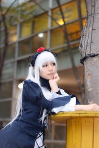 Rating: Safe Score: 0 Tags: 1girl blurry blurry_background depth_of_field flower hairband long_hair long_sleeves rose solo suigintou User: admin