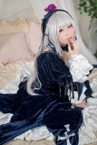 Rating: Safe Score: 0 Tags: 1girl bangs blurry blurry_background blurry_foreground depth_of_field dress flower frills gothic_lolita hairband lips lolita_fashion long_hair long_sleeves looking_at_viewer photo red_eyes rose sitting solo suigintou User: admin