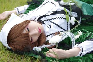 Rating: Safe Score: 0 Tags: 1girl bangs brown_hair dress frills grass green_dress heterochromia lips lolita_fashion long_sleeves looking_at_viewer lying on_back red_eyes smile solo suiseiseki User: admin