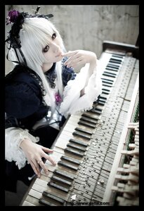 Rating: Safe Score: 0 Tags: 1girl black_border black_nails dress frills gothic_lolita instrument jewelry keyboard_(instrument) letterboxed lips lolita_fashion long_sleeves music nail_polish piano playing_instrument ring silver_hair solo suigintou white_hair wings User: admin