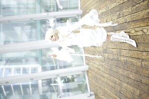Rating: Safe Score: 0 Tags: 1girl blonde_hair blurry blurry_background blurry_foreground depth_of_field dress kirakishou outdoors short_hair solo standing white_dress white_wings User: admin