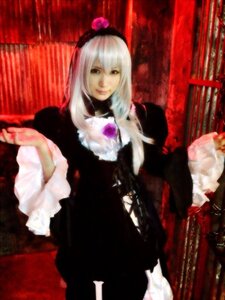 Rating: Safe Score: 0 Tags: 1girl black_dress curtains dress flower frills gothic_lolita long_hair long_sleeves sitting solo suigintou User: admin